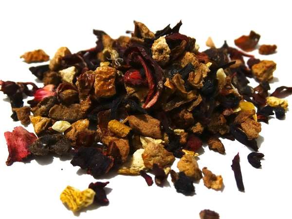 Colorful chunks of dried fruit, yellow, brown, and reddish-purple