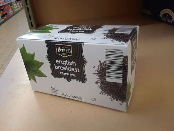 Box of Benner tea Co English Breakfast Black tea, white box, on shelf
