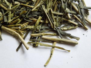Loose leaf kukicha or twig tea, showing bright green tea stems and twigs