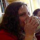 Sylvia drinking from a mug