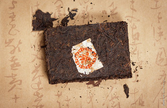 Dark tea compressed into a brick shape