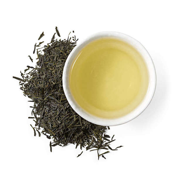 Loose-leaf dark green green tea with squarish, flaky appearance, and pale greenish-yellow cup