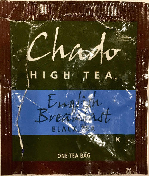 Shiny tea bag wrapper, wrinkled, reading Chado High Tea, English Breakfast Black Tea