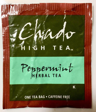 Shiny tea bag wrapper reading Chado High Tea, peppermint herbal tea
