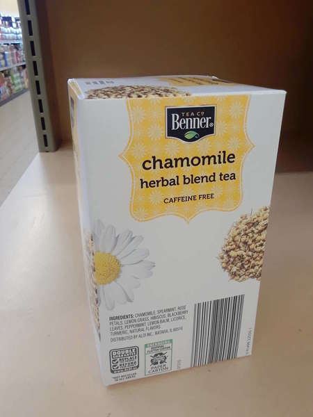 Box of Benner Tea Co Chamomile Herbal Blend Tea, showing ingredient list, on shelf